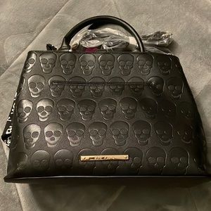 Betsey Johnson skull purse!